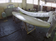 Surf simulating rig, with custom made large scale surf board and chair