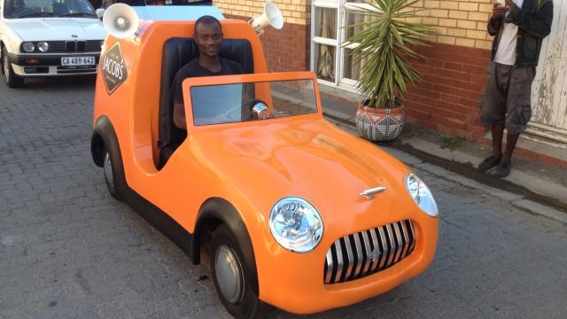 Julius Etah and the car he helped build. Special Effects Cape Town