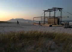 Alternating various backdrops on beach, Automation, Cape Town